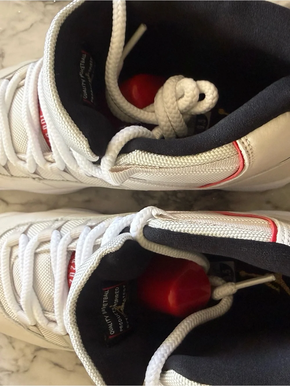 NEW Air Jordan 11 Retro in Platinum Tint and University Red